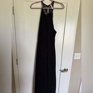 Elegant Black Sleeveless Dress with Lace Back Detail